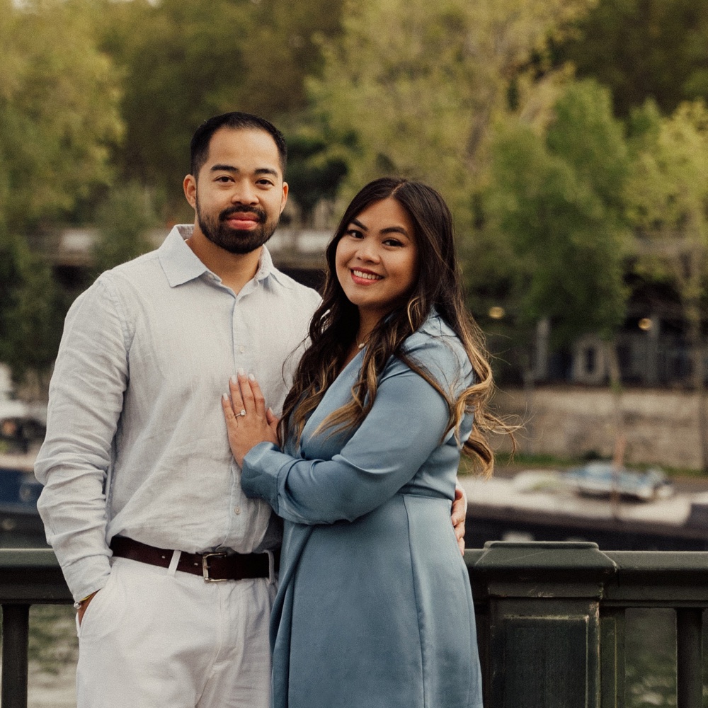 Debra and Vinh in front of the Eiffel Tower